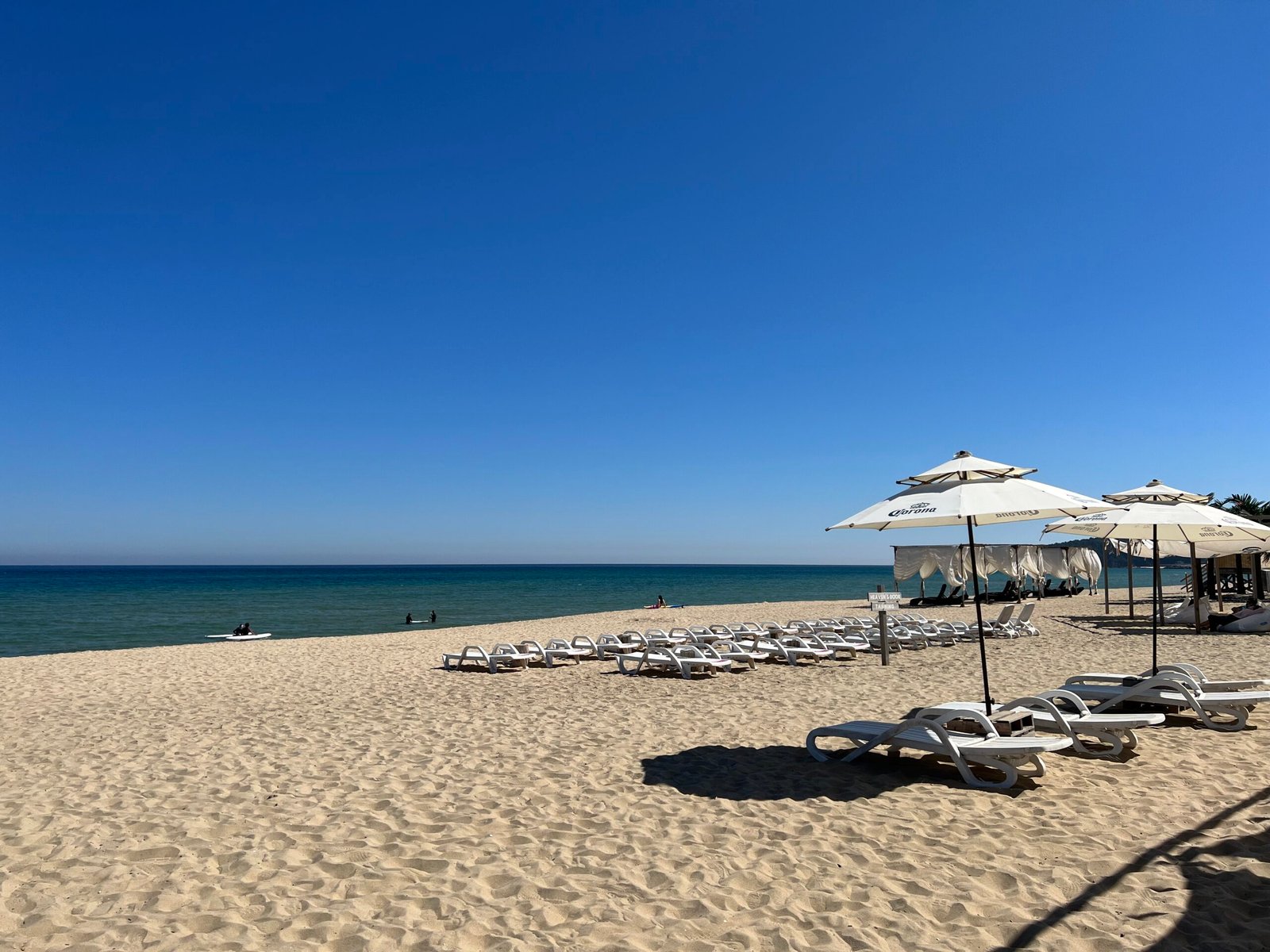 Beach loungers and umbrellas along the coast in Yangyang, South Korea