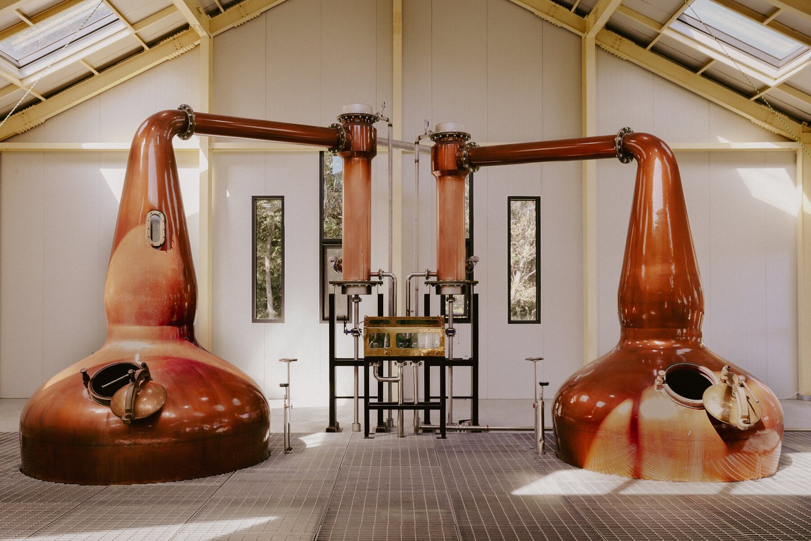 Two copper pot stills inside Ki One's production room in Namyangju
